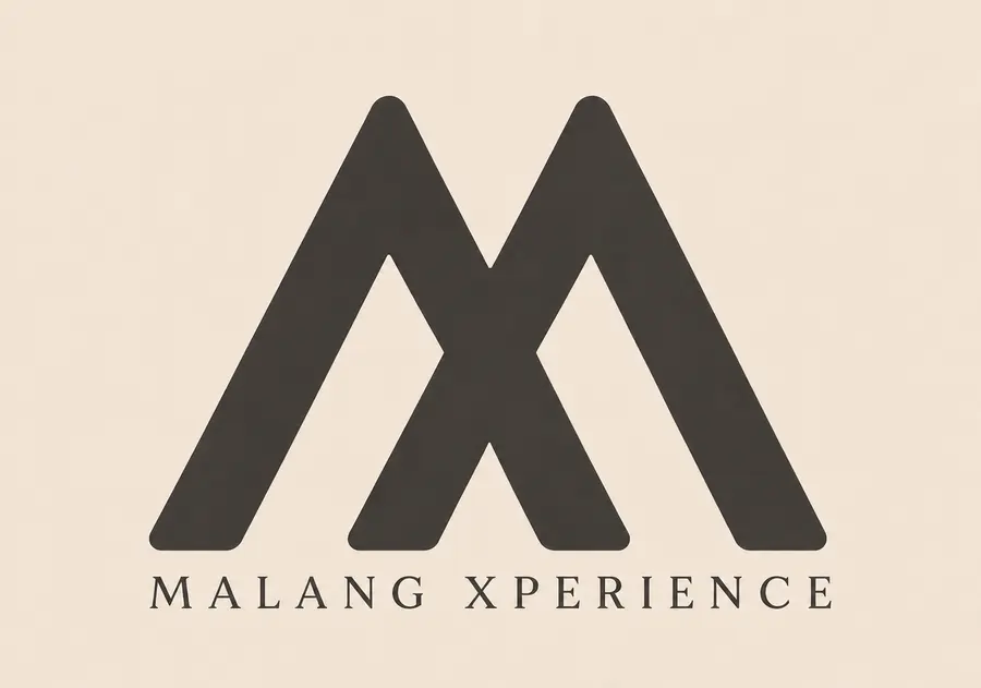 Logo Malang Xperience — huruf M dan X membentuk dua puncak gunung berwarna charcoal di atas latar krem